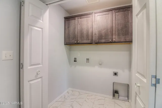 a view of a closet in a kitchen