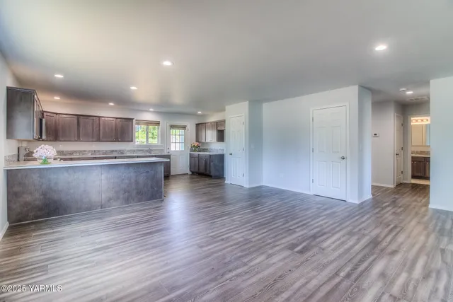 a view of kitchen with wooden floor