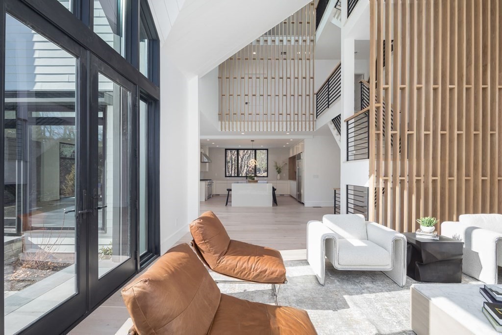 11 Willard Road Weston, MA 02493 - Photo 1 of 42 a living room with furniture and a large window