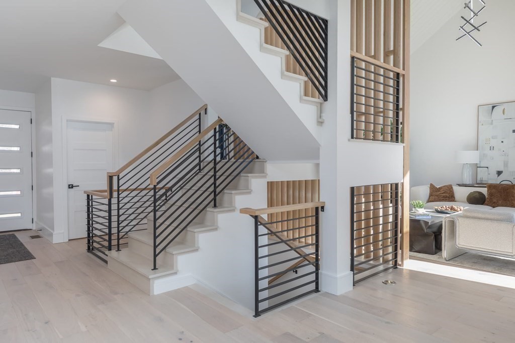 11 Willard Road Weston, MA 02493 - Photo 19 of 42 wooden floor view with staircase and white walls