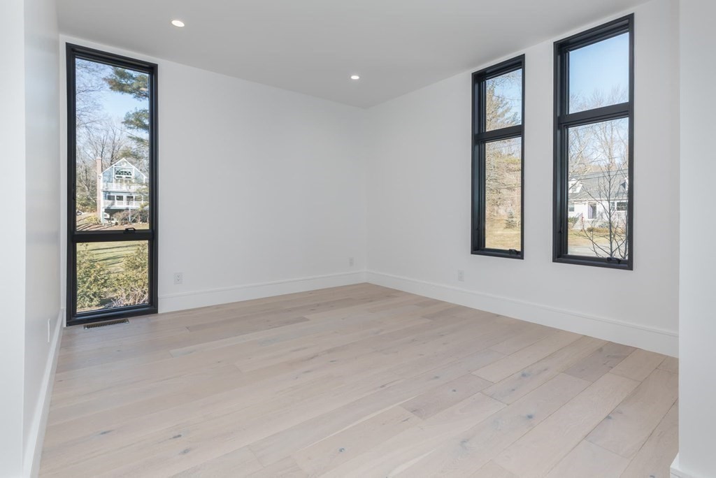 11 Willard Road Weston, MA 02493 - Photo 21 of 42 an empty room with windows and closet