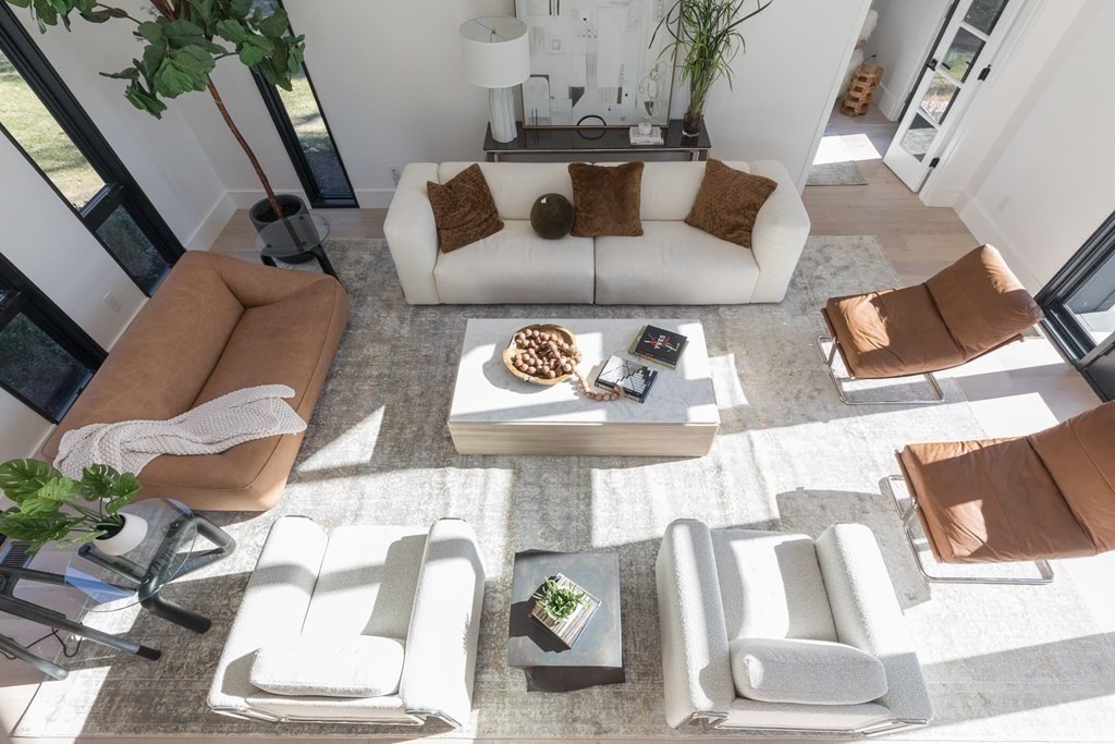 11 Willard Road Weston, MA 02493 - Photo 24 of 42 a living room with furniture and floor to ceiling windows