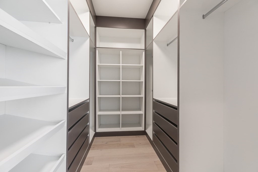 11 Willard Road Weston, MA 02493 - Photo 29 of 42 a view of walk in closet with empty racks