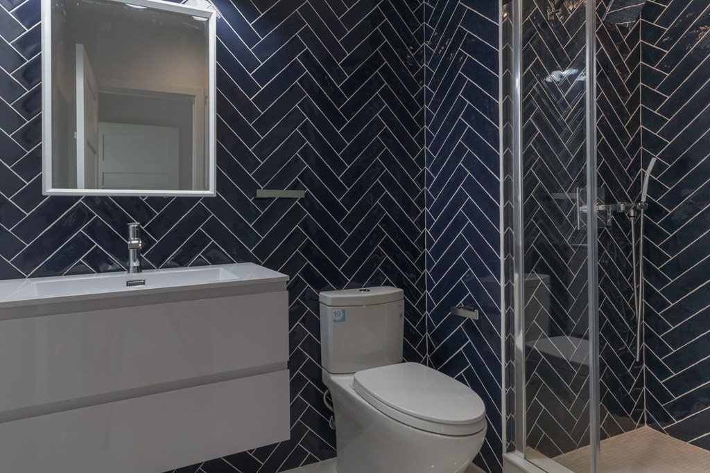 11 Willard Road Weston, MA 02493 - Photo 33 of 42 a bathroom with a toilet and a sink