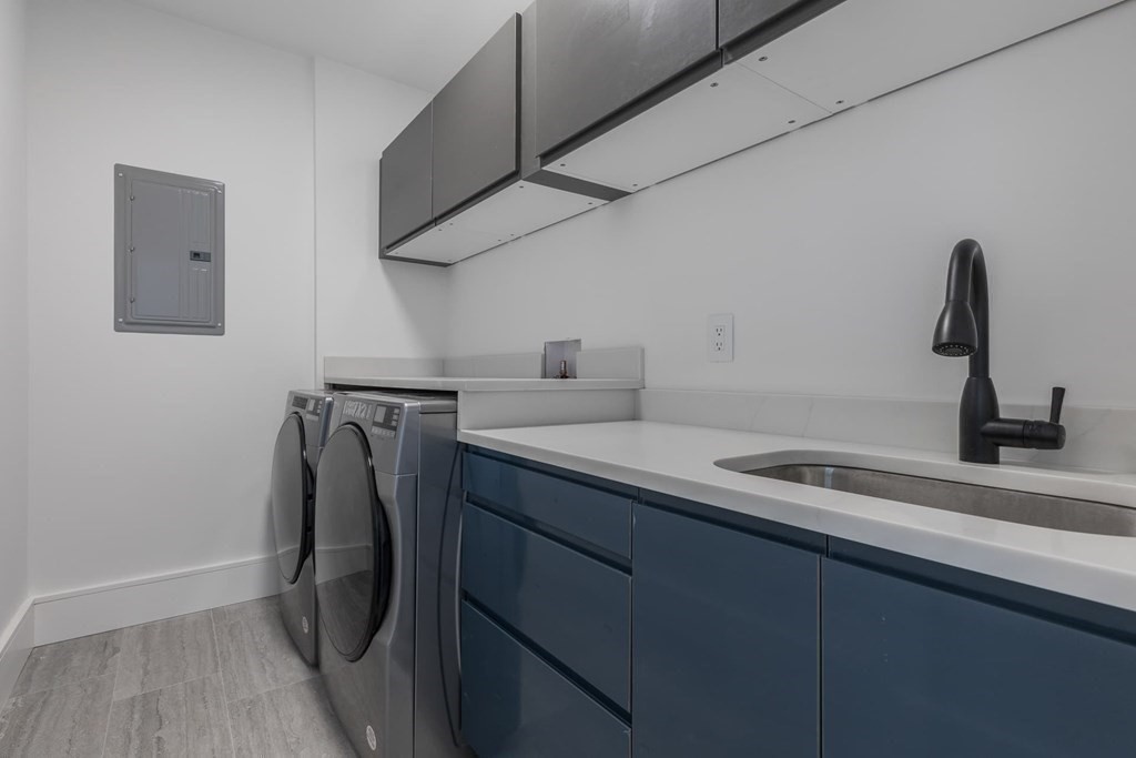 11 Willard Road Weston, MA 02493 - Photo 34 of 42 a utility room with dryer and washer