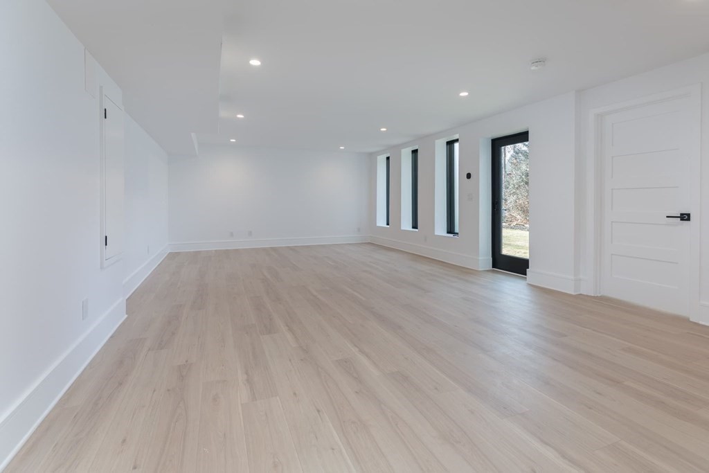11 Willard Road Weston, MA 02493 - Photo 37 of 42 a view of an empty room with wooden floor