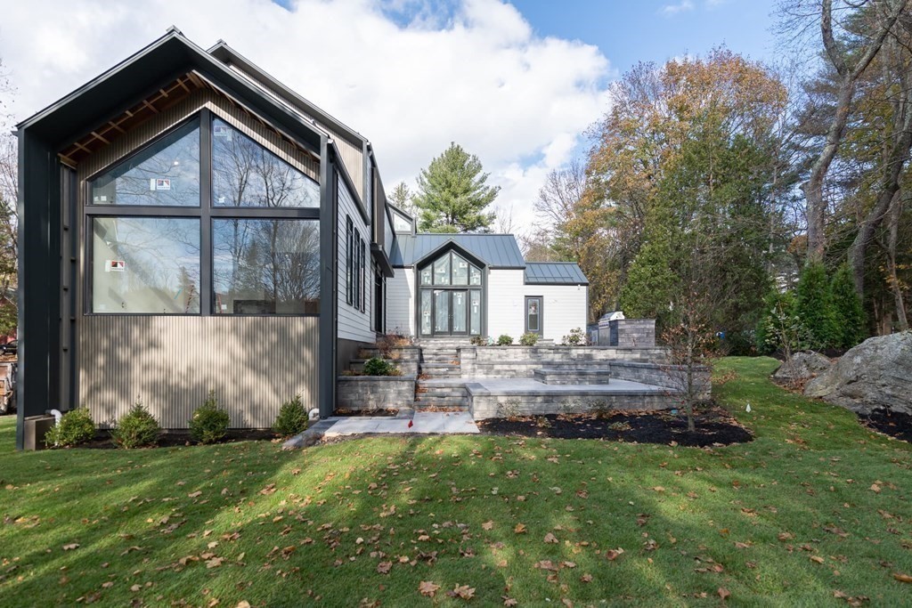 11 Willard Road Weston, MA 02493 - Photo 39 of 42 a front view of a house with garden