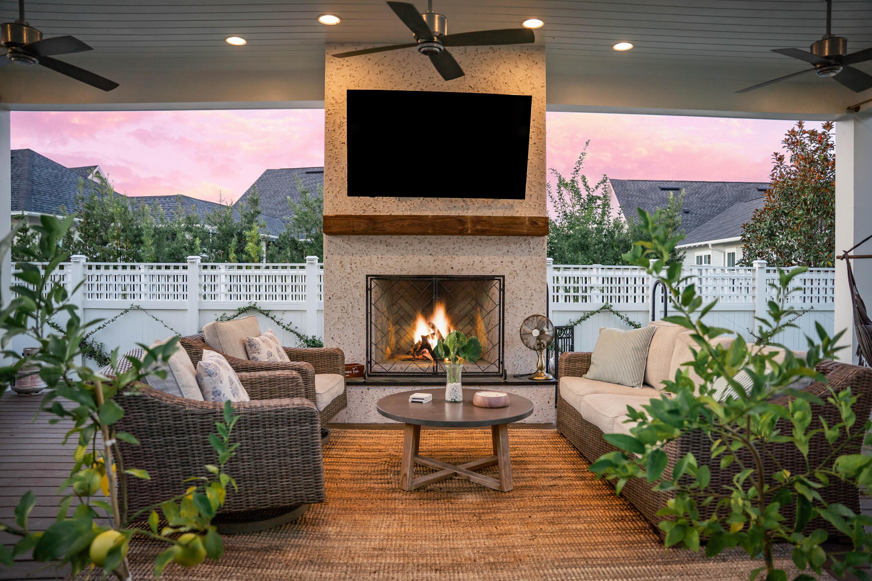 231 Catface Dr Inlet Beach Inlet Beach, FL 32461 - Photo 11 of 45 a living room with furniture a flat screen tv and a fireplace