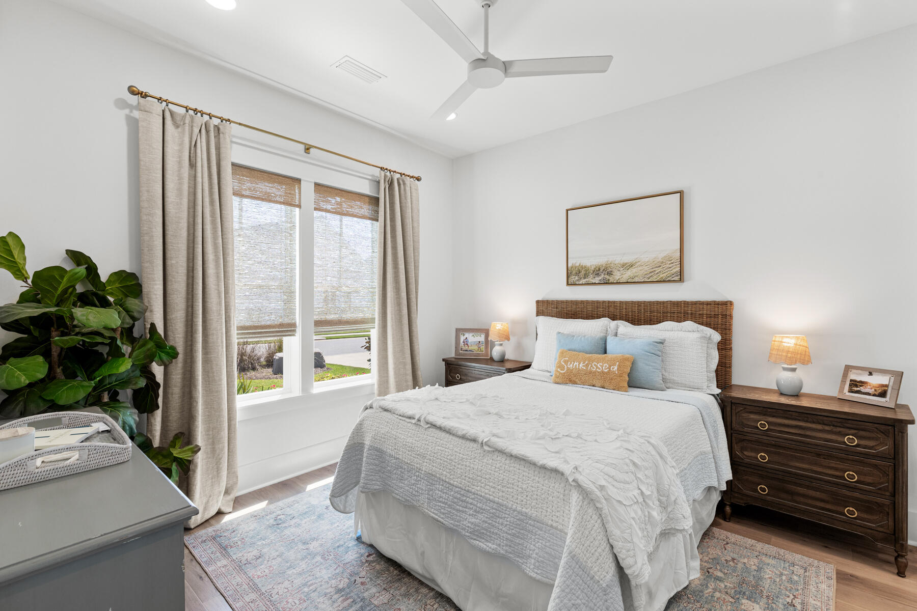 231 Catface Dr Inlet Beach Inlet Beach, FL 32461 - Photo 18 of 45 a bedroom with a bed and a potted plant