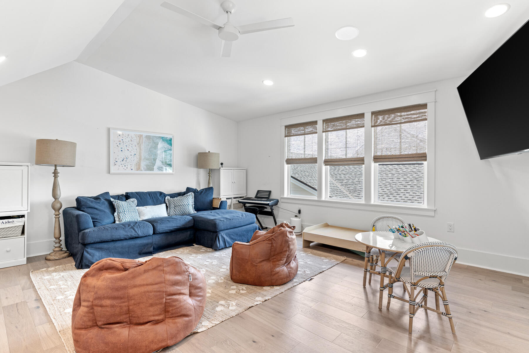 231 Catface Dr Inlet Beach Inlet Beach, FL 32461 - Photo 29 of 45 a living room with furniture and a flat screen tv