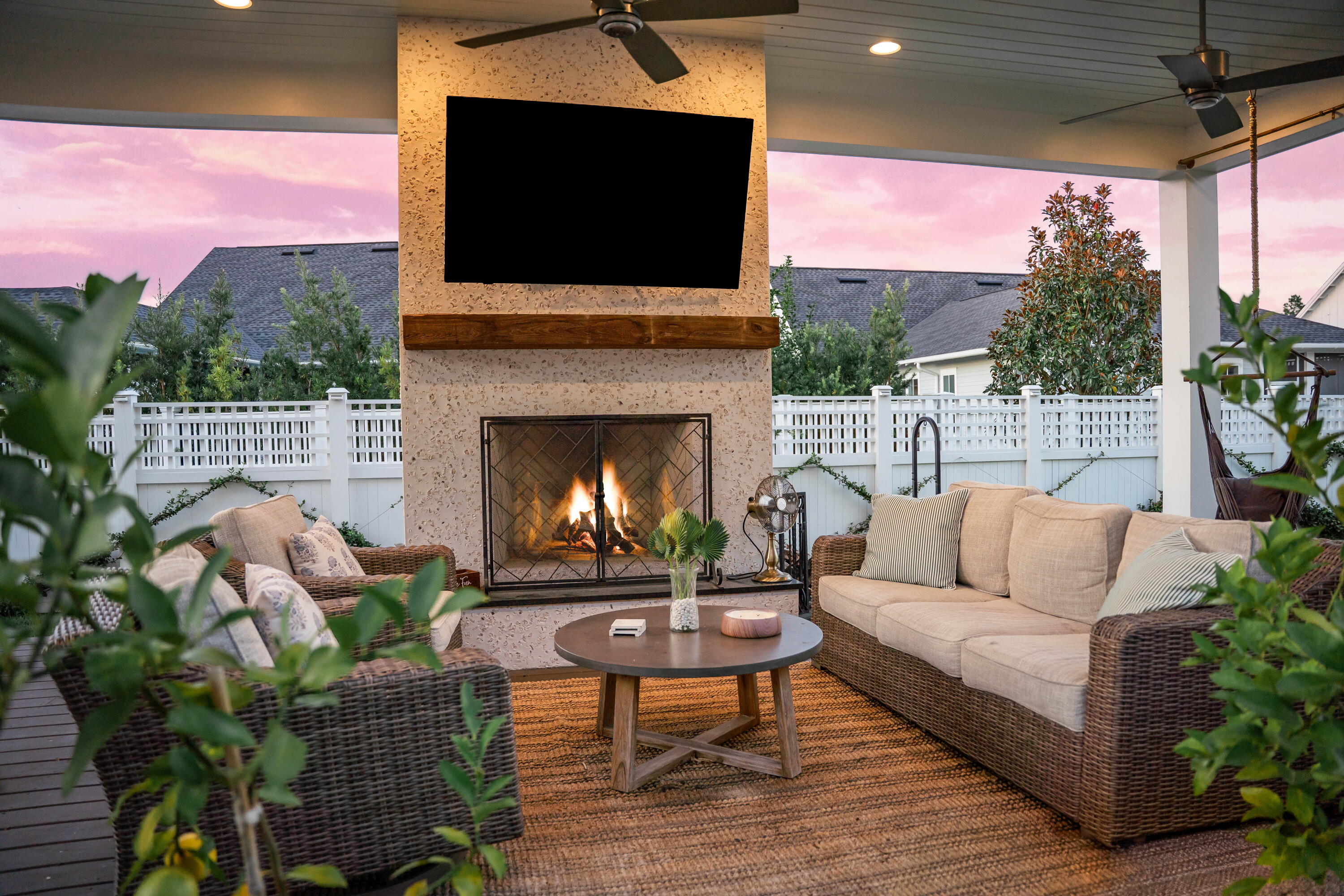 231 Catface Dr Inlet Beach Inlet Beach, FL 32461 - Photo 34 of 45 a outdoor space with patio fireplace couches and a fireplace