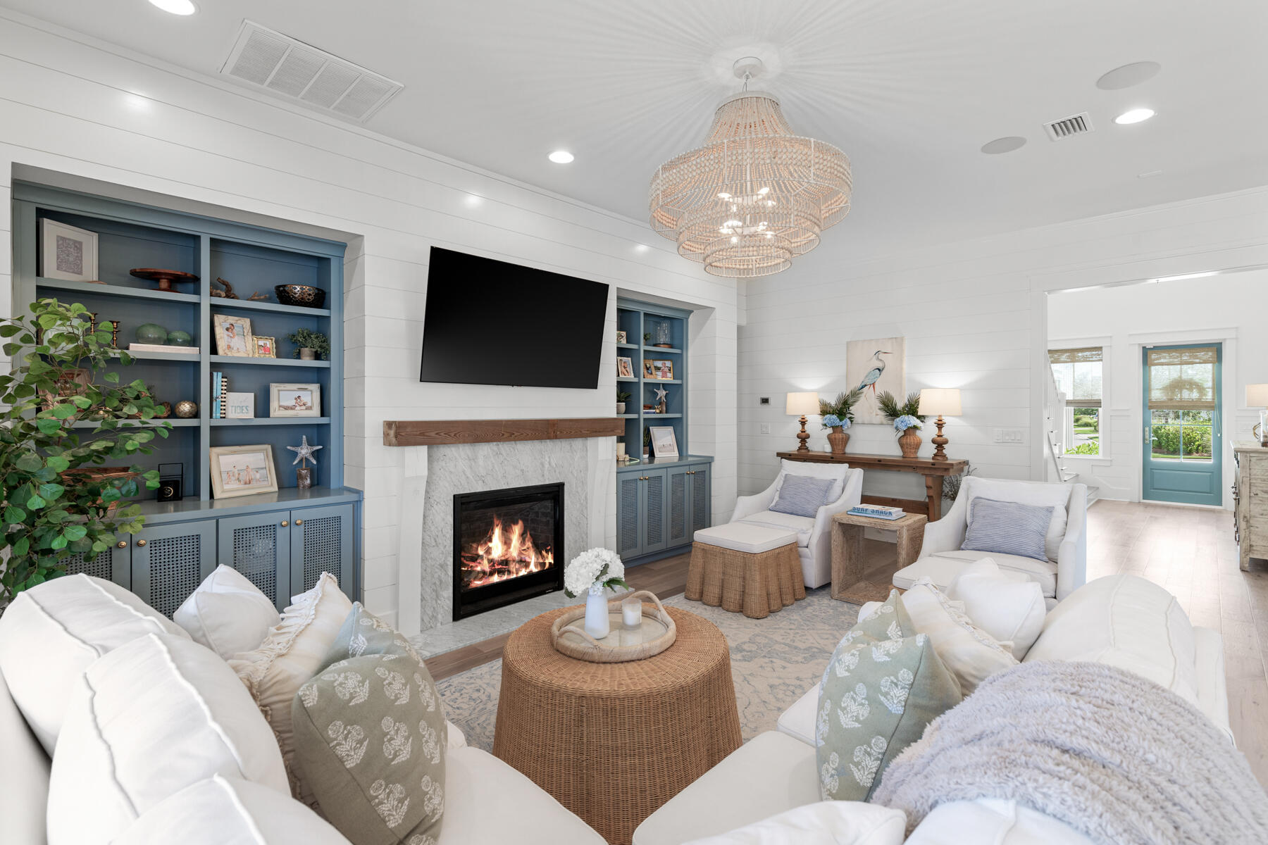 231 Catface Dr Inlet Beach Inlet Beach, FL 32461 - Photo 7 of 45 a living room with furniture a fireplace and a flat screen tv