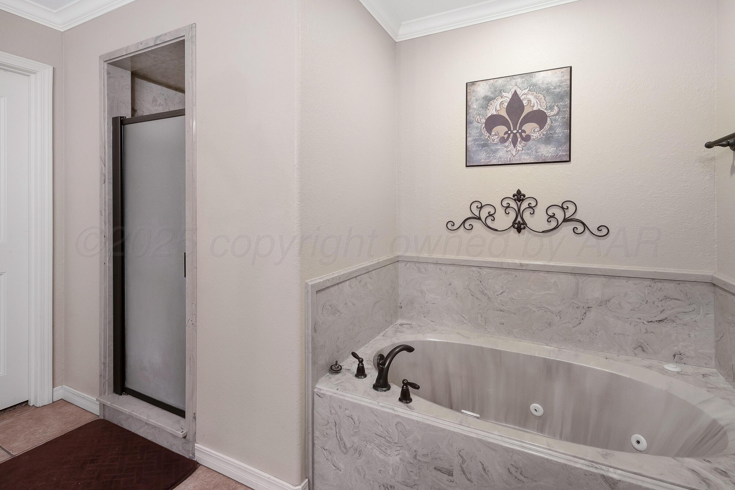 1371 Grasslands Road Bushland, TX 79124 - Photo 17 of 36 16-Primary Bath and Shower