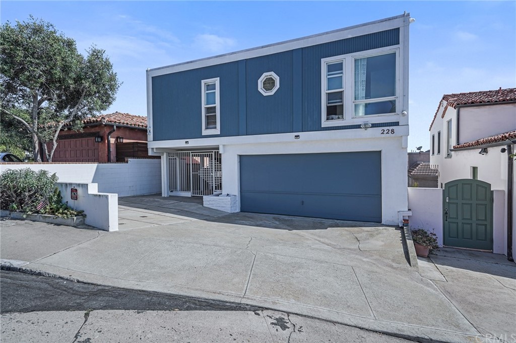 228 Redlands Street Playa del Rey, CA 90293 - Photo 2 of 22 2 car garage with additional parking in the driveway and off to the side