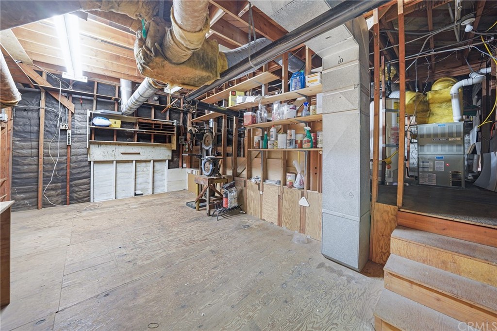 228 Redlands Street Playa del Rey, CA 90293 - Photo 22 of 22 Very large unfinished room downstairs off the family room, not included in the square footage. Possibly be an office AND a gym OR and ADU. It has a separate door entrance to outside. Another storage area off to the right which could be a wine cellar!