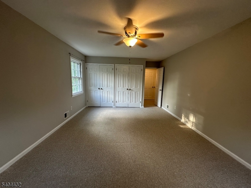 151 Osprey Road Hackettstown, NJ 07840 - Photo 7 of 9 a view of an empty room with a window