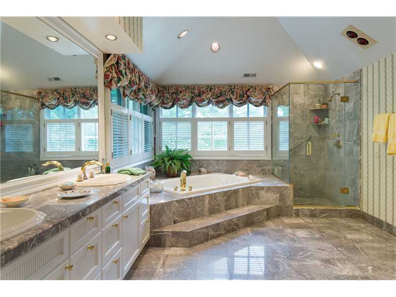 56 Dingletown Road Greenwich, CT 06830 - Photo 12 of 20 a bathroom with a tub sink and mirror