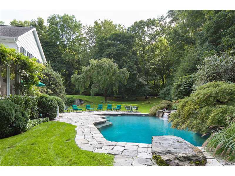 56 Dingletown Road Greenwich, CT 06830 - Photo 18 of 20 a view of a swimming pool with a outdoor seating