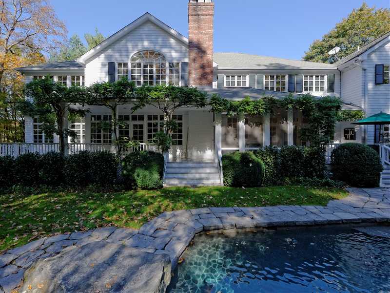 56 Dingletown Road Greenwich, CT 06830 - Photo 19 of 20 a front view of a house with garden