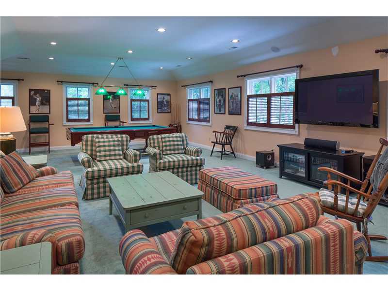 56 Dingletown Road Greenwich, CT 06830 - Photo 10 of 20 a living room with furniture kitchen view and a flat screen tv