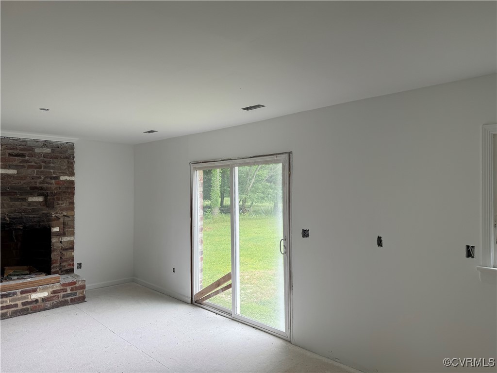 8900 Strath Road Henrico, VA 23231 - Photo 33 of 49 Unfurnished living room with a fireplace and visib
