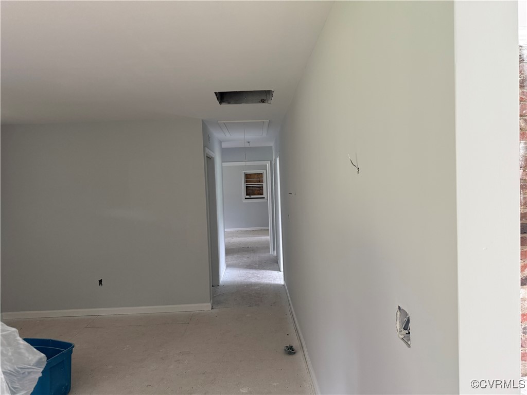 8900 Strath Road Henrico, VA 23231 - Photo 36 of 49 Hall with baseboards and attic access