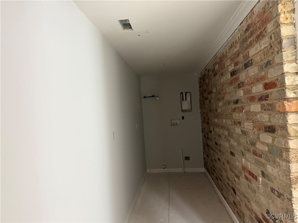 8900 Strath Road Henrico, VA 23231 - Photo 49 of 49 Corridor with brick wall and baseboards