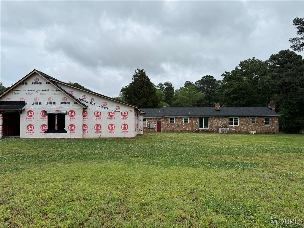 8900 Strath Road Henrico, VA 23231 - Photo 8 of 49 View of front of house with a chimney and a front