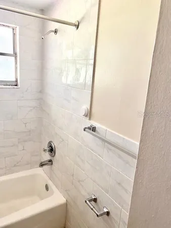 a bathroom with a bathtub