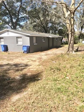 a view of empty room with a yard