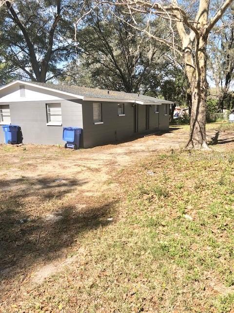 9418 Greystone Road Thonotosassa, FL 33592 - Photo 19 of 19 a view of empty room with a yard