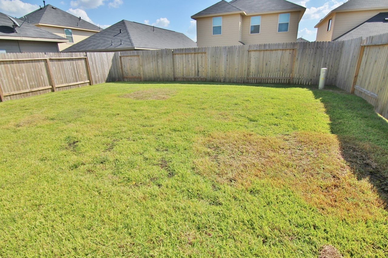 2422 West Werrington Way Houston, TX 77073 - Photo 2 of 13 a view of a backyard