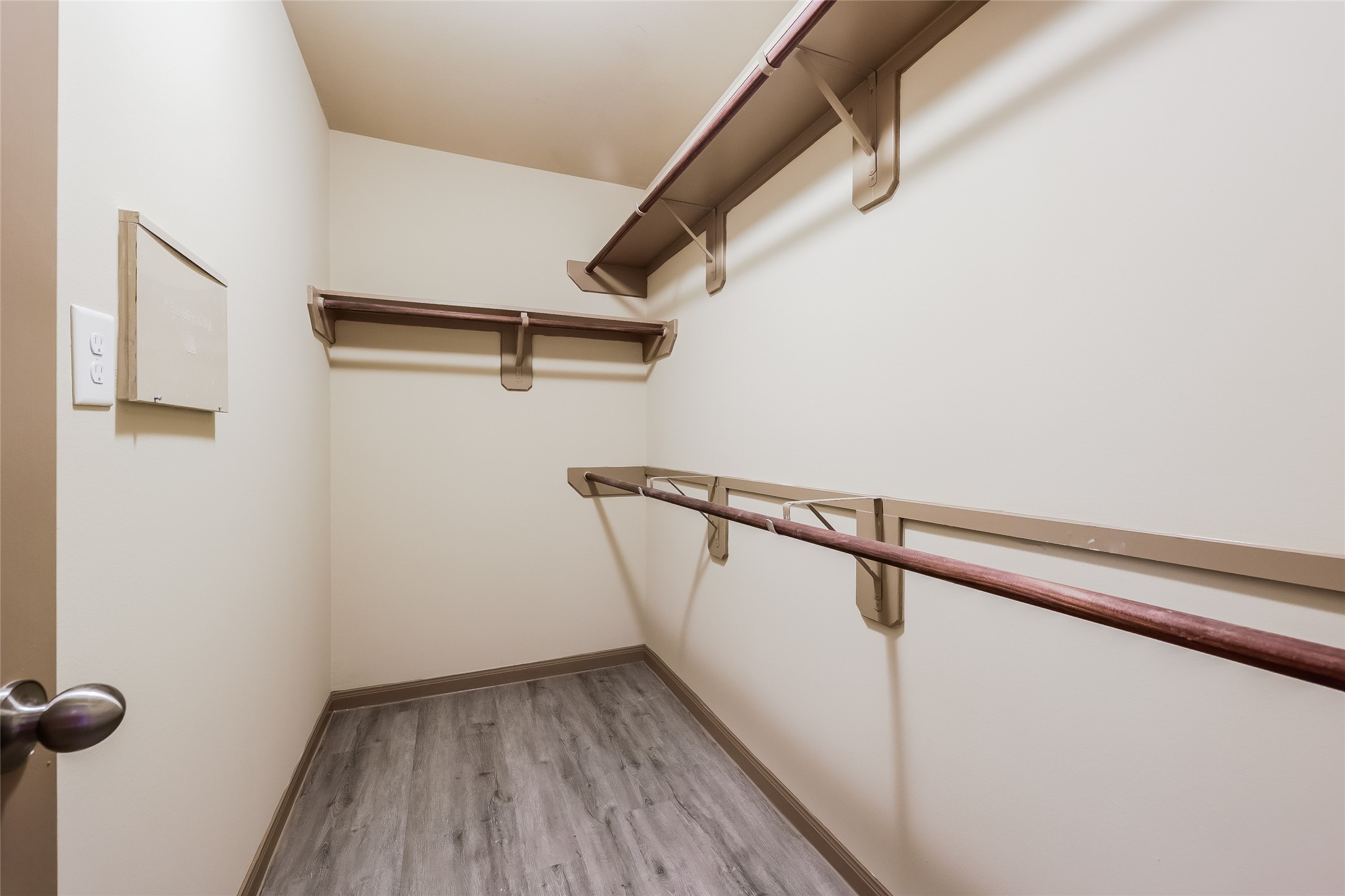 2422 West Werrington Way Houston, TX 77073 - Photo 10 of 13 a view of small space with racks on the wall