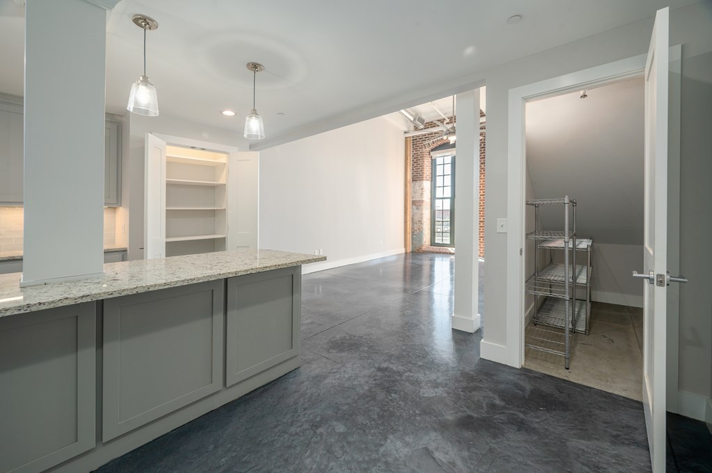 1201 Front Avenue, Unit 514 Columbus, GA 31901 - Photo 12 of 39 a view of a bathroom with a sink and mirror