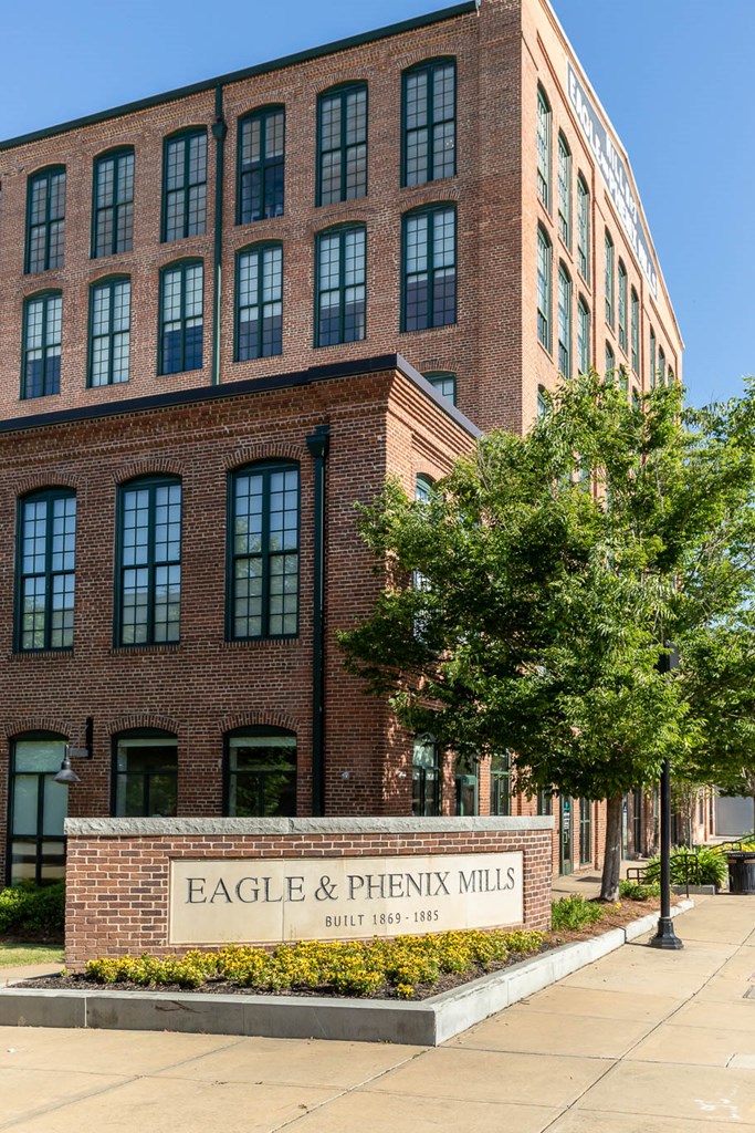 1201 Front Avenue, Unit 514 Columbus, GA 31901 - Photo 36 of 39 a building with trees in front of it