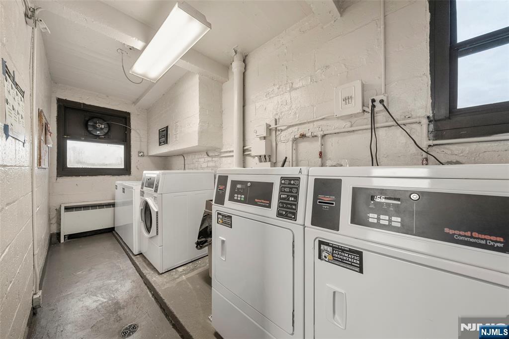 3040 Edwin Avenue, Unit 4A Fort Lee, NJ 07024 - Photo 14 of 15 a utility room with dryer and washer