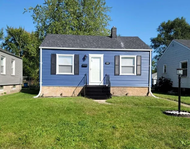 a house view with a garden space