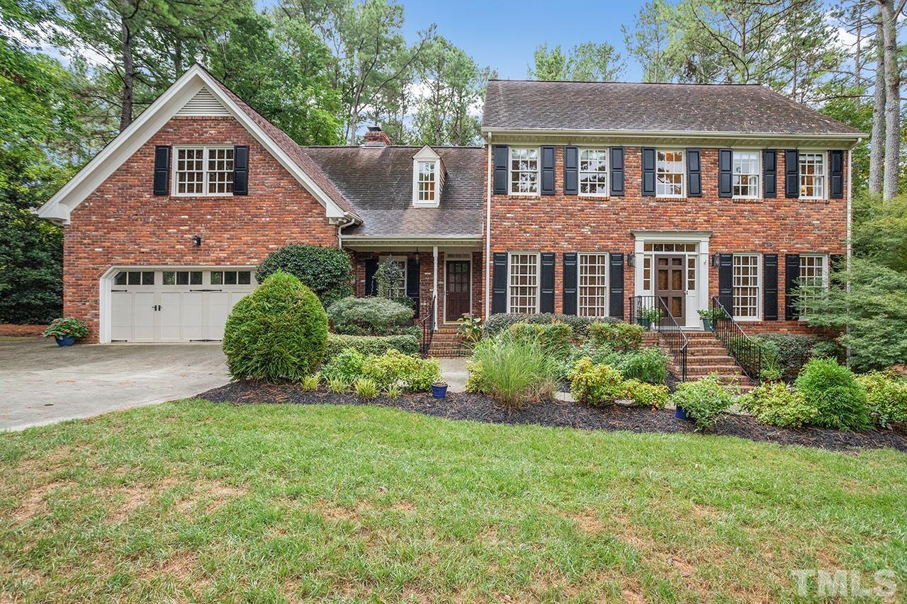 717 Presnell Court Raleigh, NC 27615 - Photo 1 of 36 a front view of a house with a yard and garage