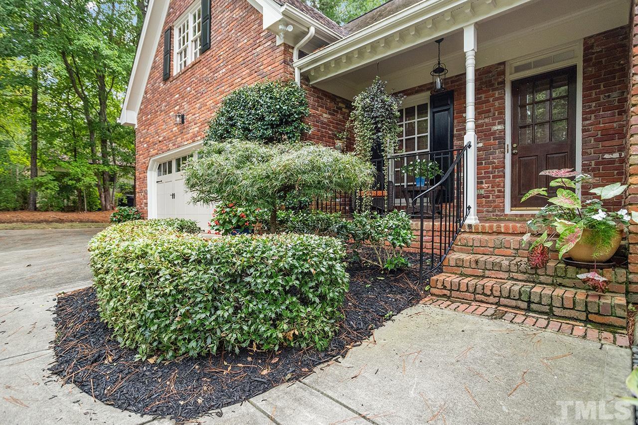 717 Presnell Court Raleigh, NC 27615 - Photo 2 of 36 a view of a chair and table in the backyard