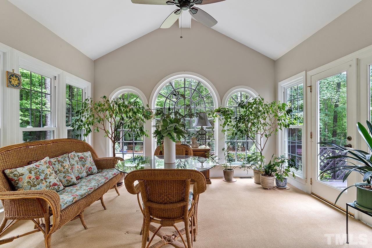 717 Presnell Court Raleigh, NC 27615 - Photo 32 of 36 a living room with furniture and a large window