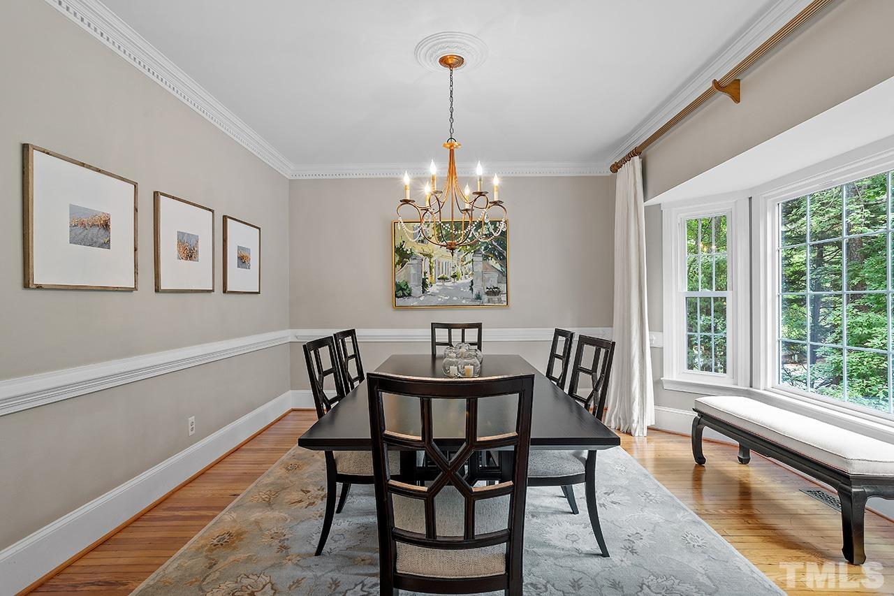 717 Presnell Court Raleigh, NC 27615 - Photo 7 of 36 a view of a dining room with furniture window and outside view