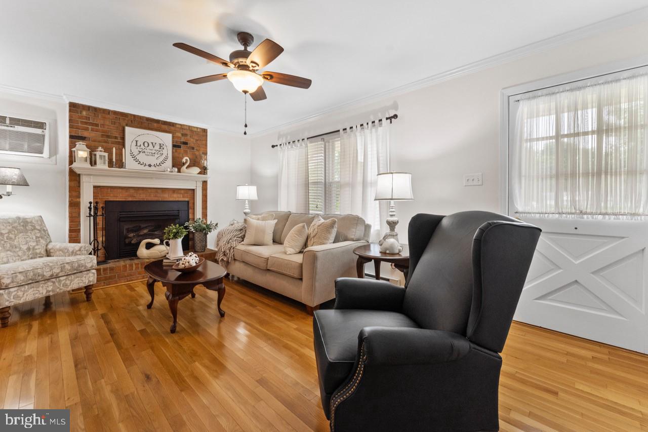 1118 Eppings Tract Road Montross, VA 22520 - Photo 5 of 28 Formal Living Room w/brick manteled FP & wood flrs