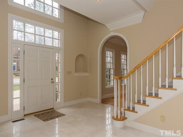 7613 Rainwater Road Raleigh, NC 27615 - Photo 2 of 25 Dramatic 3 story entry w/ marble flooring. This room is 13.9x14!
