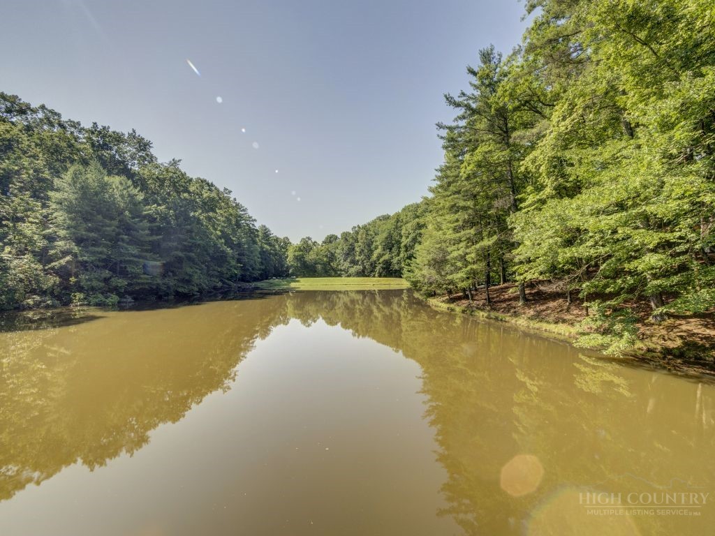 265 Trout Lake Road Deep Gap, NC 28618 - Photo 38 of 50 a view of a lake with a city
