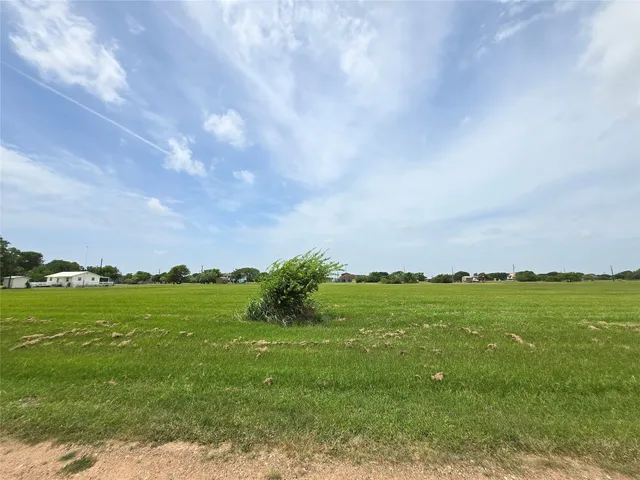 a view of yard with an outdoor space