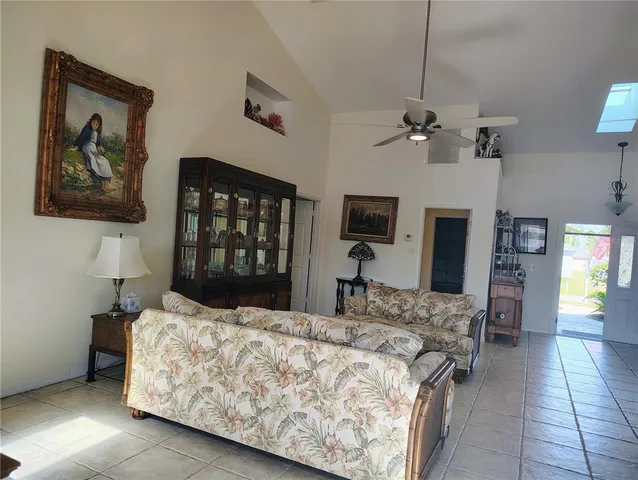 a view of a workspace with furniture and entryway
