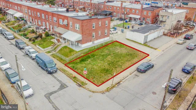 an aerial view of a pool with a terrace