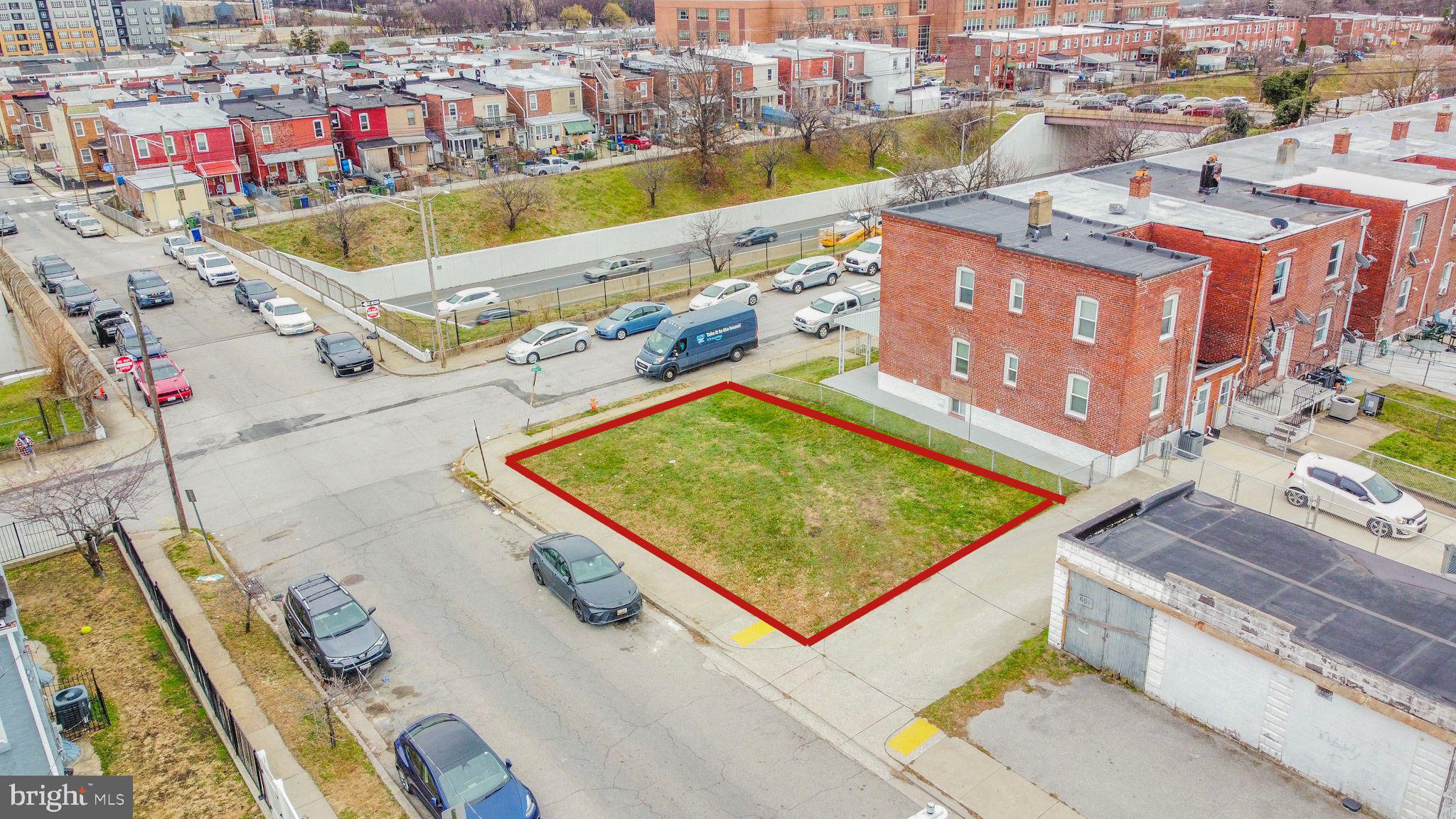 600 Quail Street Baltimore, MD 21224 - Photo 3 of 12 a view of swimming pool with a lounge chairs