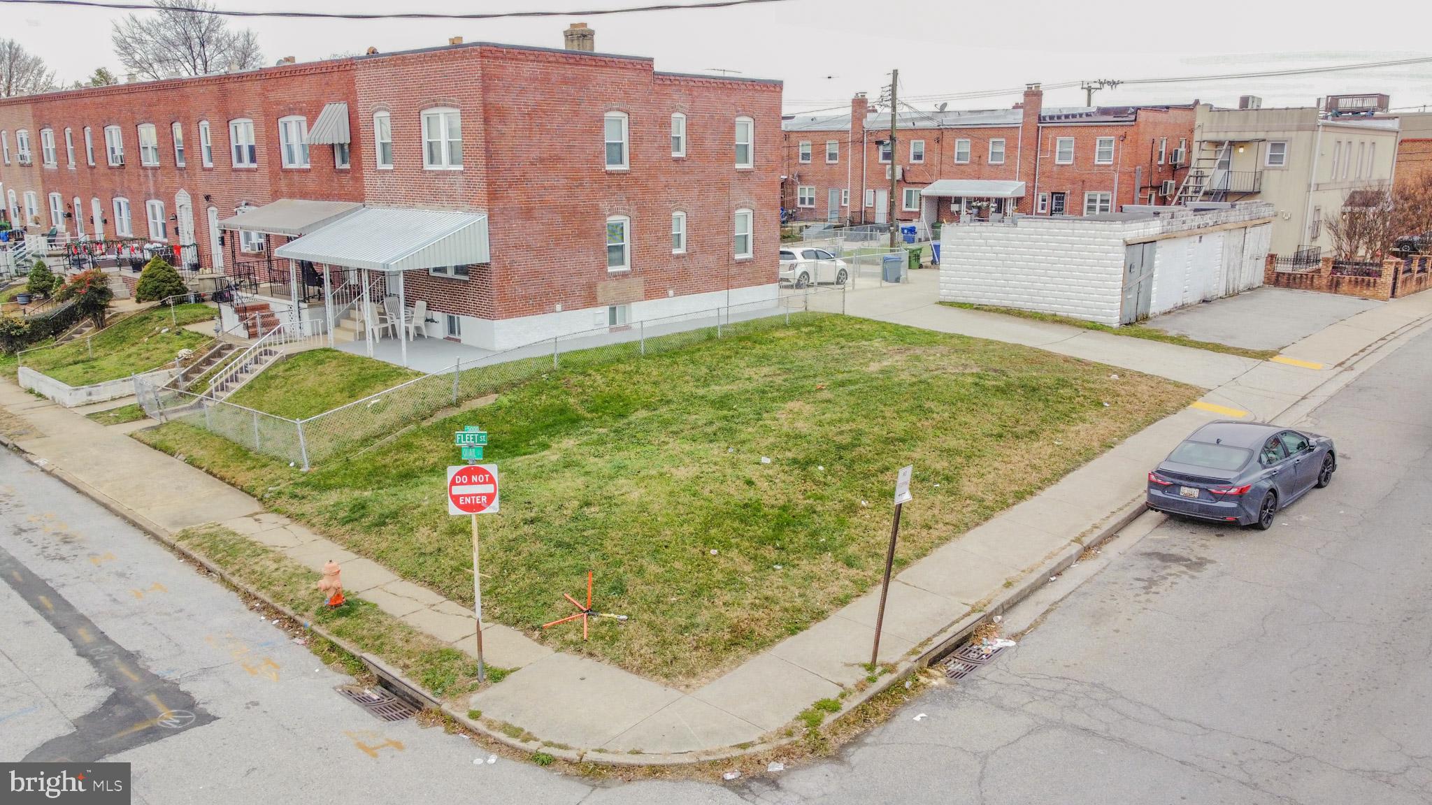 600 Quail Street Baltimore, MD 21224 - Photo 6 of 12 a view of a swimming pool with a lounge chairs