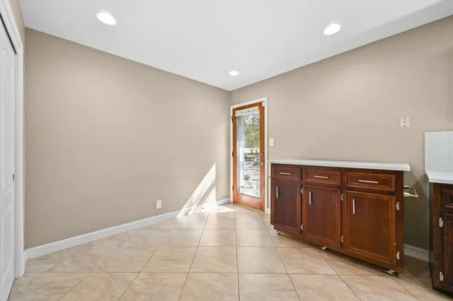 a view of a hallway with closet